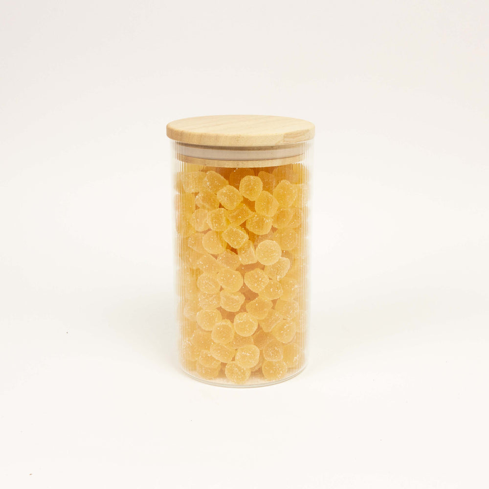 Glazen uitdeelpot geribbeld met houten deksel