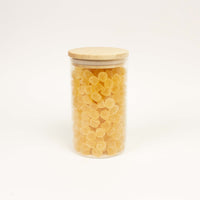 Glazen uitdeelpot geribbeld met houten deksel